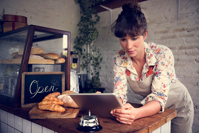 Bakery Business Owner Using Tablet